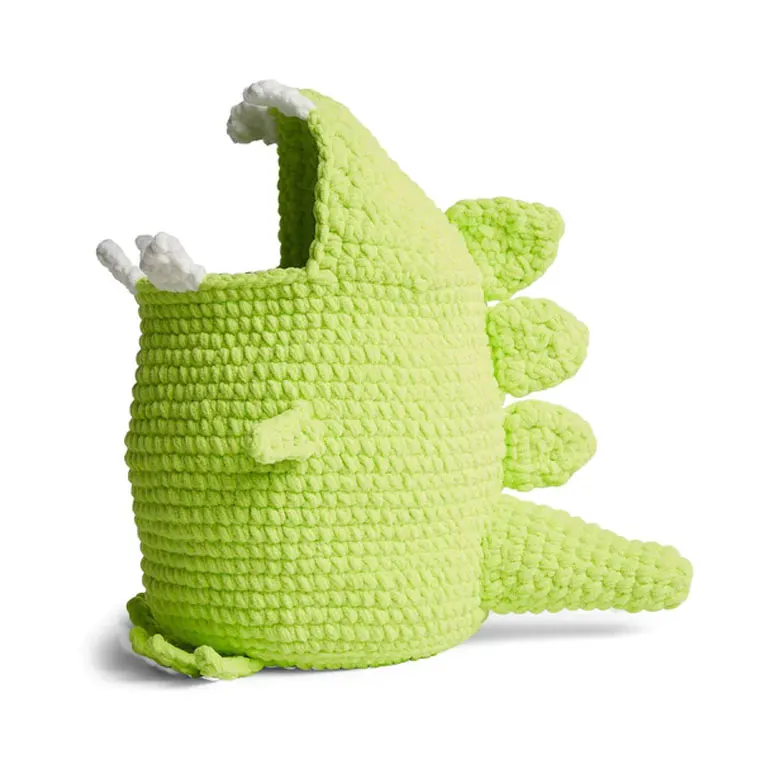 free crocheted dinosaur toy storage basket pattern. crocheted green dinosaur storage basket with white teeth