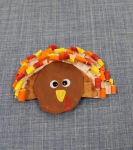 curly turkey kid craft - fall kid craft - paper plate craft - thanksgiving kid craft - amorecraftylife.com #kidscraft #craftsforkids #preschool