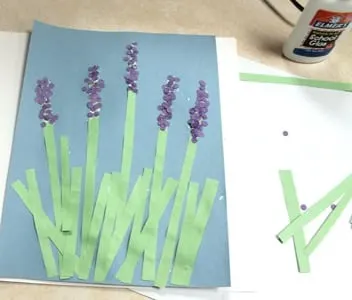 paper flower kid craft - spring flower kid crafts - crafts for kids - kid craft -#kidscraft #preschool #craftsforkids amorecraftylife.com
