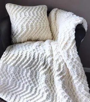 cable blanket crochet pattern - afghan crochet pattern - amorecraftylife.com #crochet #crochetpattern #diy