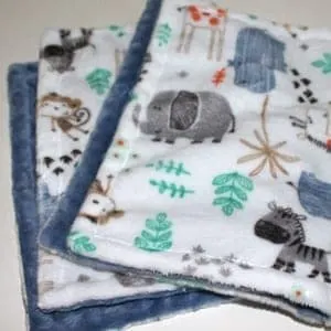 jungle minky baby blanket - baby blanket gift set tutorial- minky tips- safari zoo nursery - amorecraftylife.com #tutorial #baby #nursery #babygift #sewing #tips