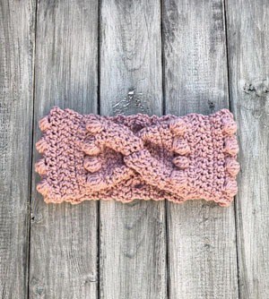 This image has an empty alt attribute; its file name is bobble-ear-warmer-crochet-pattern-headband.jpg