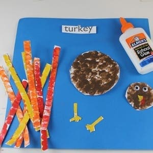 fingerprint turkey kid craft - fall kid craft - thanksgiving kid craft - amorecraftylife.com #kidscraft #craftsforkids #preschool