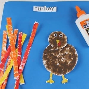 fingerprint turkey kid craft - fall kid craft - thanksgiving kid craft - amorecraftylife.com #kidscraft #craftsforkids #preschool