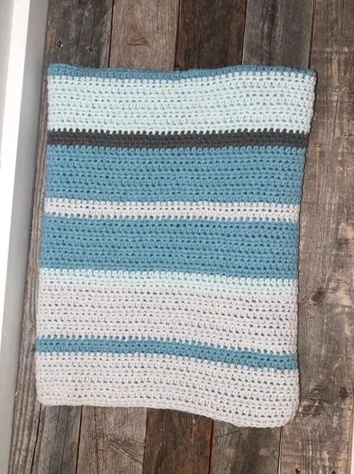 stripe baby boy crochet blanket pattern - amorecraftylife.com -butta yarn - baby afghan - free printable crochet pattern #baby #crochet #crochetpattern #freecrochetpattern