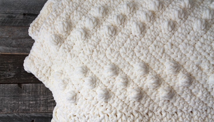 modern chunky chevron crochet blanket pattern - amorecraftylife.com - ripple afghan - free printable crochet pattern #crochet #crochetpattern #freecrochetpattern