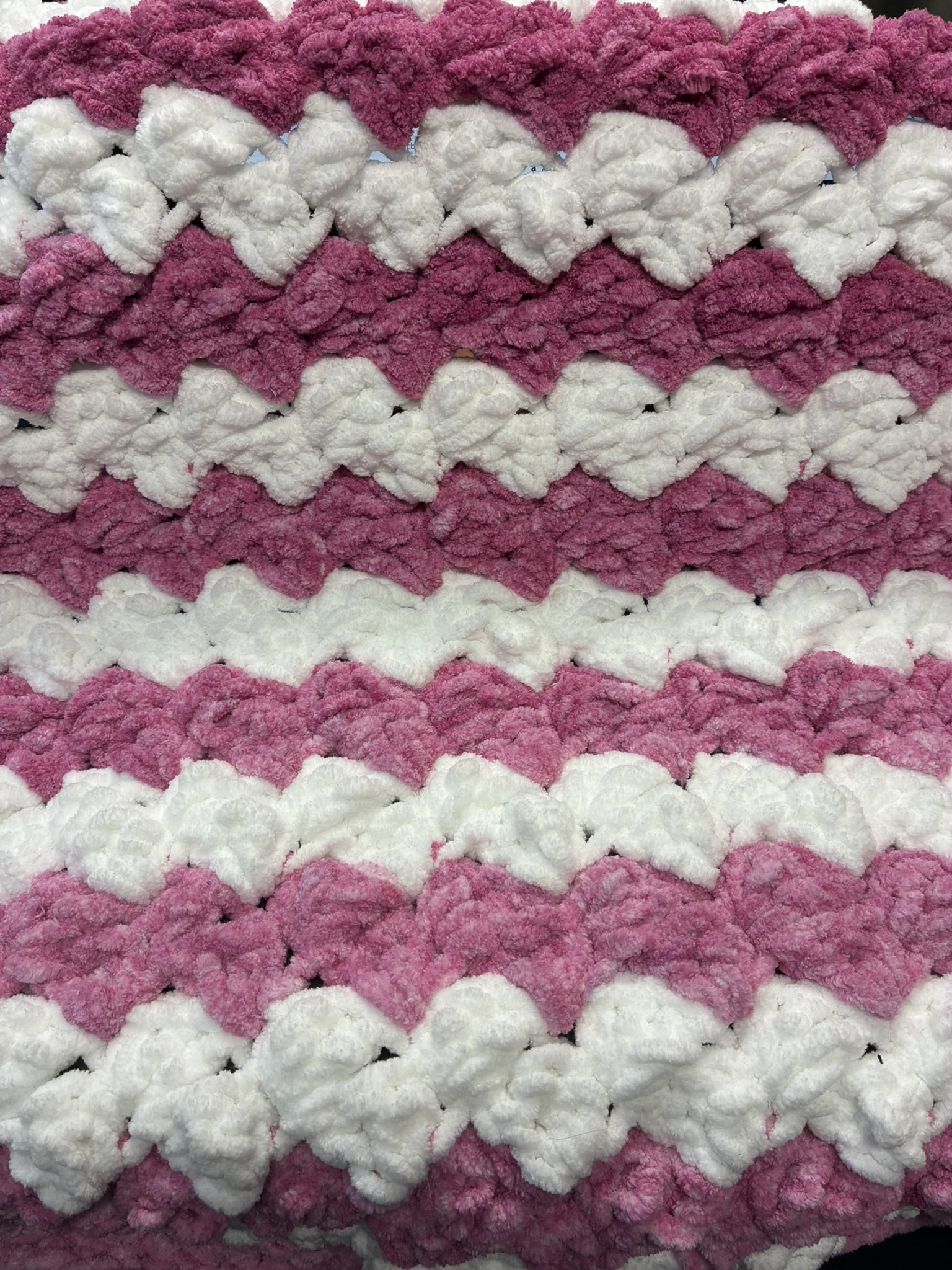 pink and white stripe Bernat Baby Blanket yarn crochet blanket 