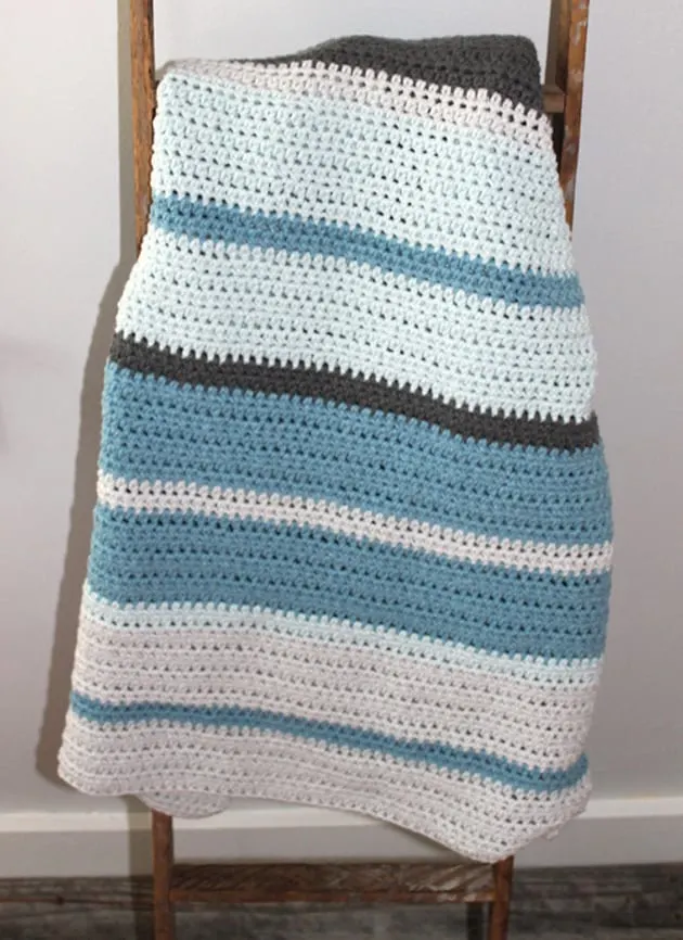 Make this easy crochet blanket using the half double crochet stitch.