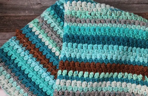 easy chunky blanket free pdf pattern - amorecraftylife.com - baby afghan - bulky yarn - free printable crochet pattern - caron cake yarn #baby #crochet #crochetpattern #freecrochetpattern