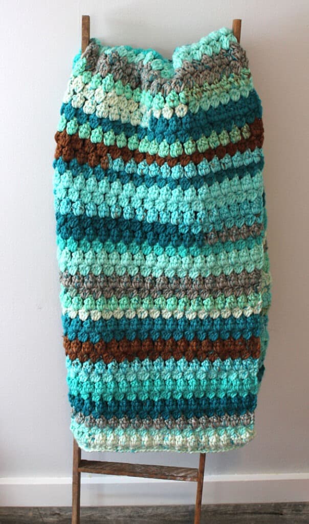 easy chunky blanket free pdf pattern - amorecraftylife.com - baby afghan - bulky yarn - free printable crochet pattern - caron cake yarn #baby #crochet #crochetpattern #freecrochetpattern