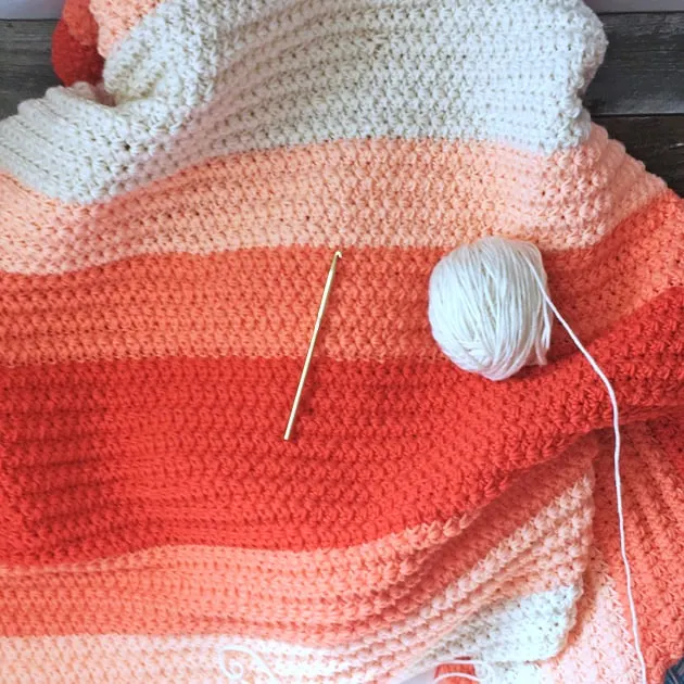 coral ombre crochet blanket free pattern- amorecraftylife.com -crocheted afghan - free printable crochet pattern - #crochet #crochetpattern #freecrochetpattern