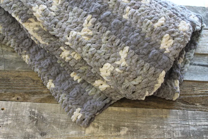 Try this easy free chunky throw blanket crocheting pattern.