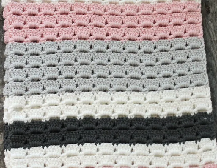 The box stitch is a great crochet stitch for blanket or scarves. The pattern works up quickly.