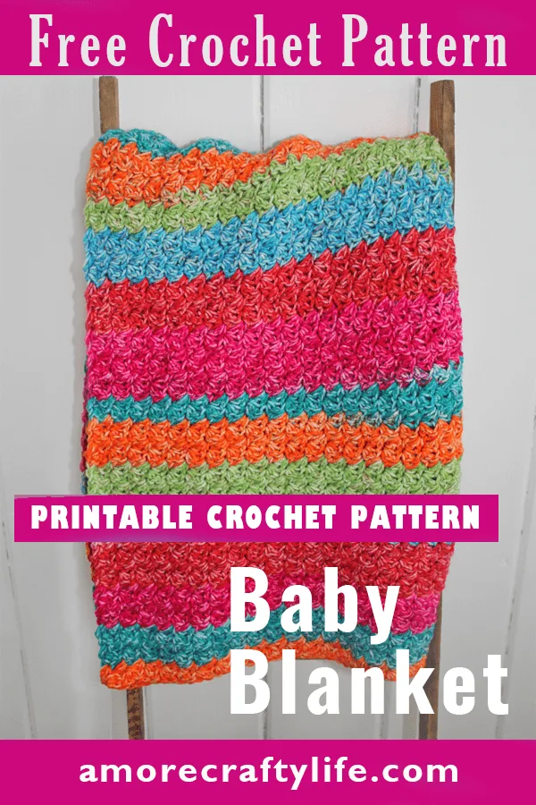 Try this easy Suzette Rainbow Baby Blanket Crochet Pattern. This colorful blanket has a simple 1 row repeat pattern using a self striping yarn. amorecraftylife.com