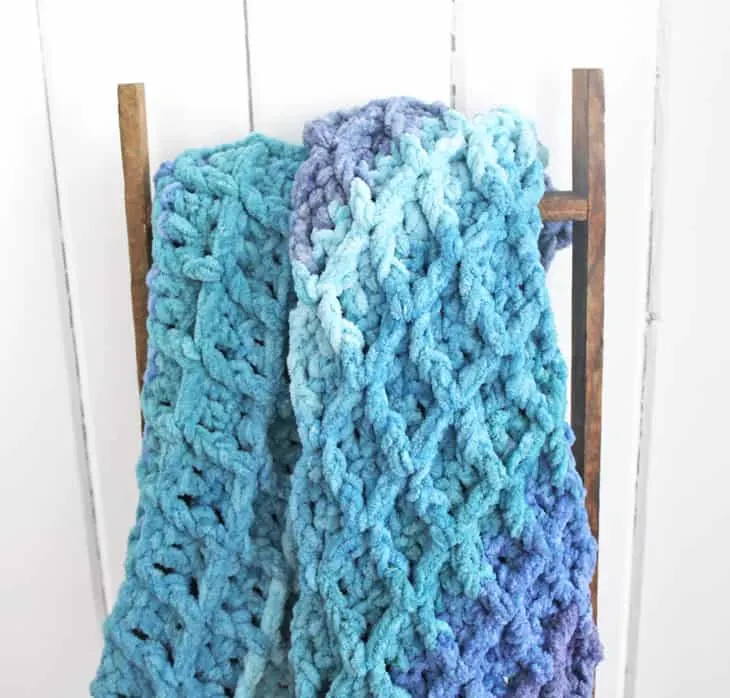 Try this ombre waffle chunky crochet baby blanket pattern. This easy pattern uses basic stitches to make this textured box.