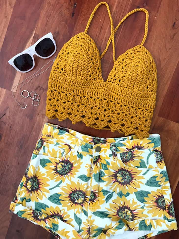 Try some summer crochet top patterns. There are lots of different tops to try.
