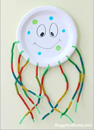Make a fun jellyfish craft using a plate and pipe cleaners. This craft would be great for an ocean theme.