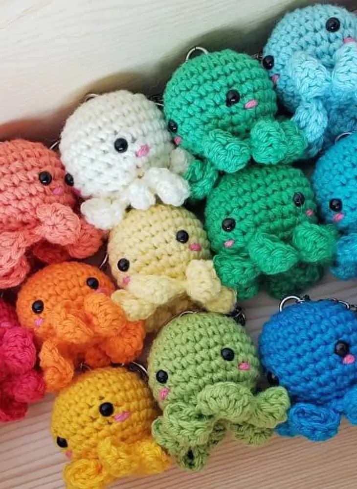 Make a cute crochet octopus. This adorable stuffed animal would make a cute gift. 
