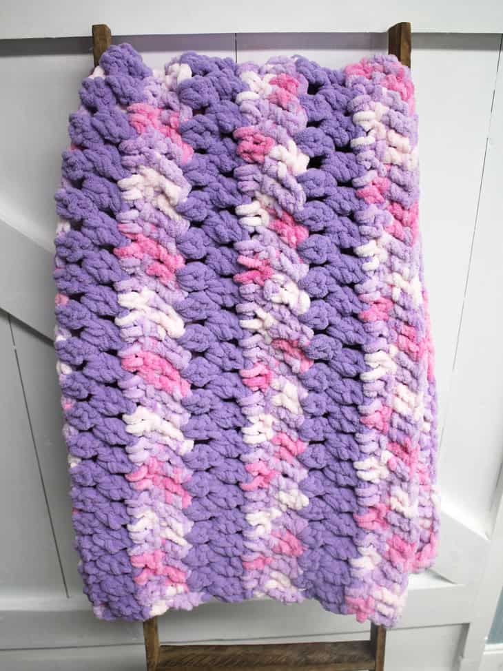 Try this easy crochet baby blanket pattern. There is a free printable PDF available. There are lots of other free blanket patterns available on amorecraftylife.com