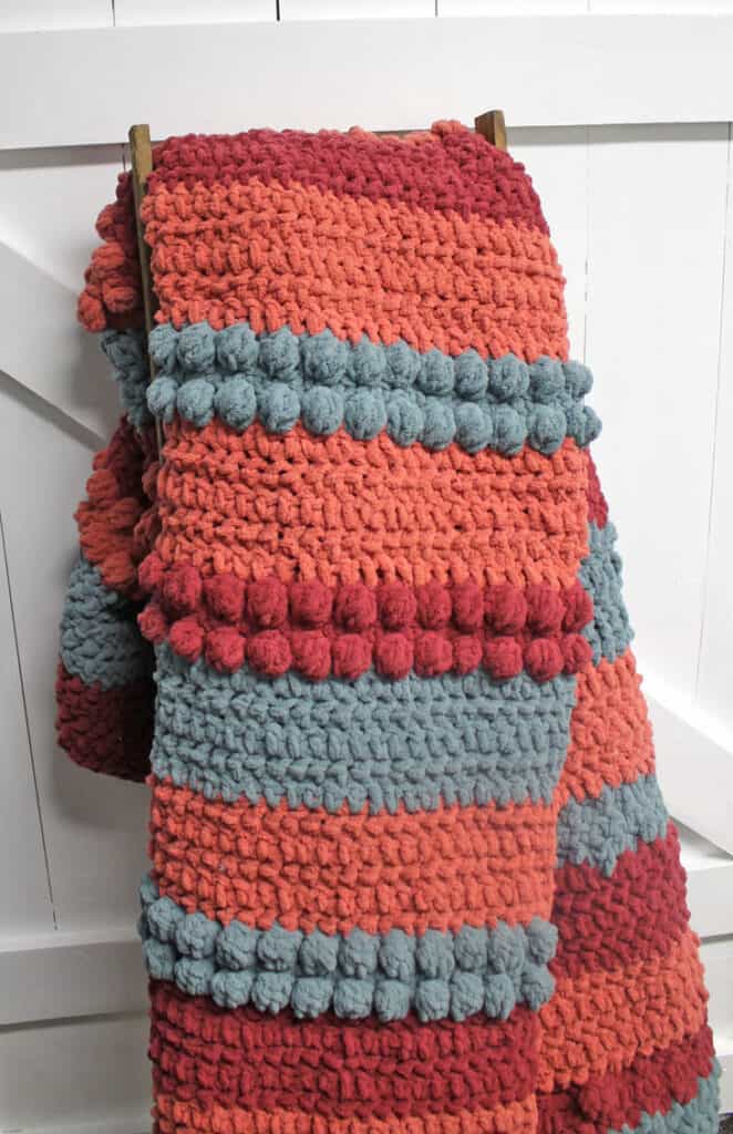 Try this easy Triple Berry Chunky Throw Pattern. This pattern uses a combination of basic stitches to make raised bobbles.