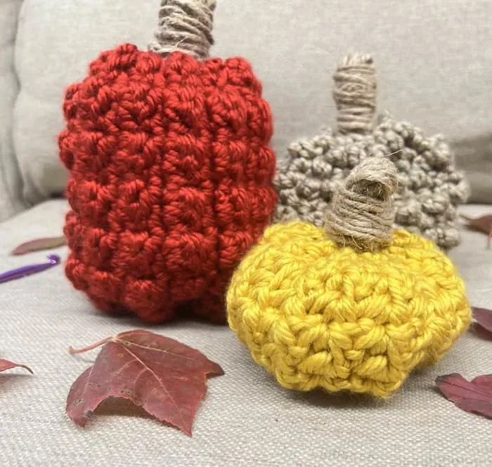Make some easy crochet pumpkin patterns in 3 different sizes and textures.