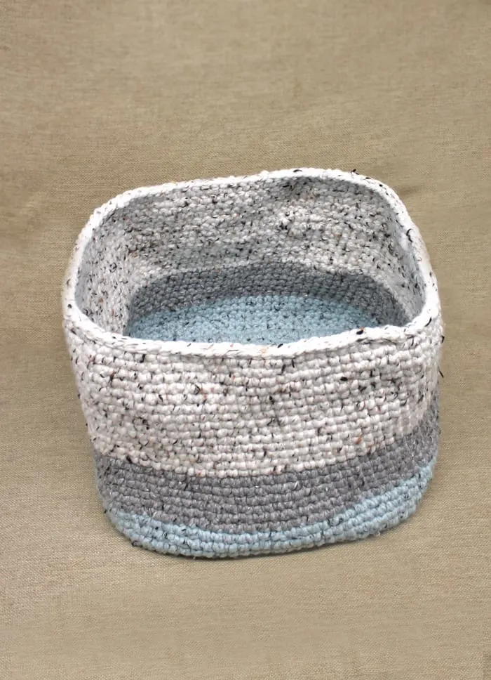 Get organized. Make your own Gray Tweed Chunky Square Crochet Basket Pattern.