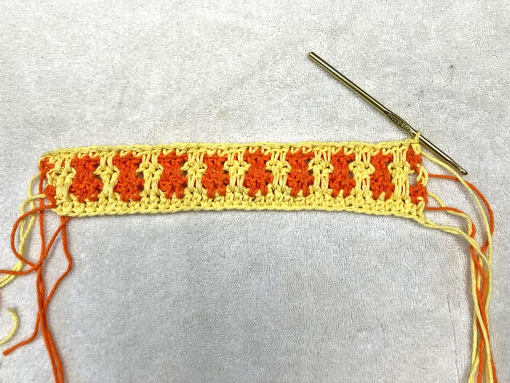 finishing step for the interlocking block stitch