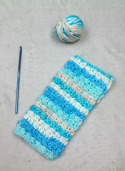 Try this free little dot crochet dishcloth pattern. This is an easy pattern with a raised dot texture.
