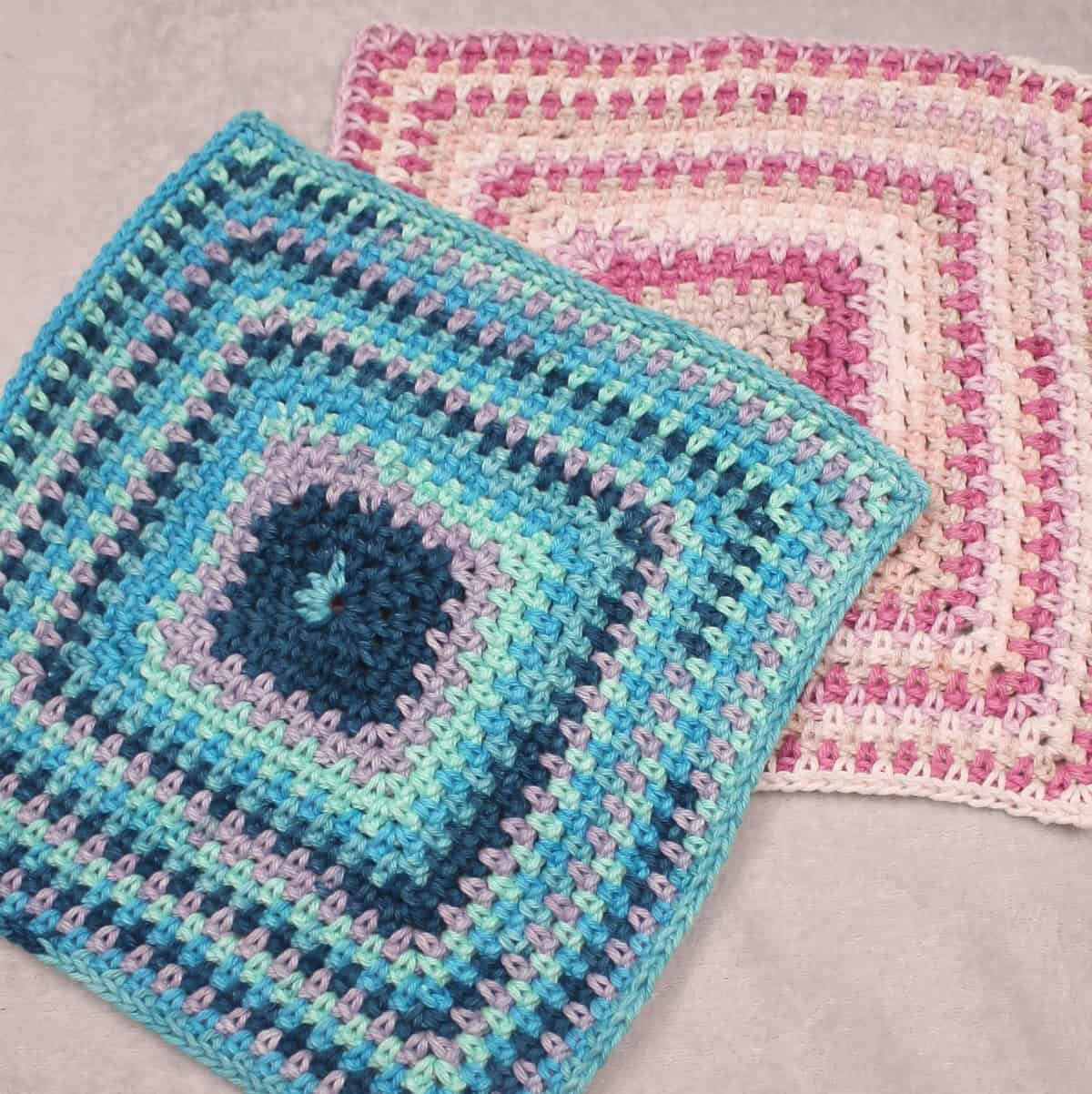 crocheted moss stitch square in pink and blue