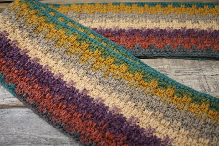 Try this easy striped crochet scarf pattern. There is a free PDF available.