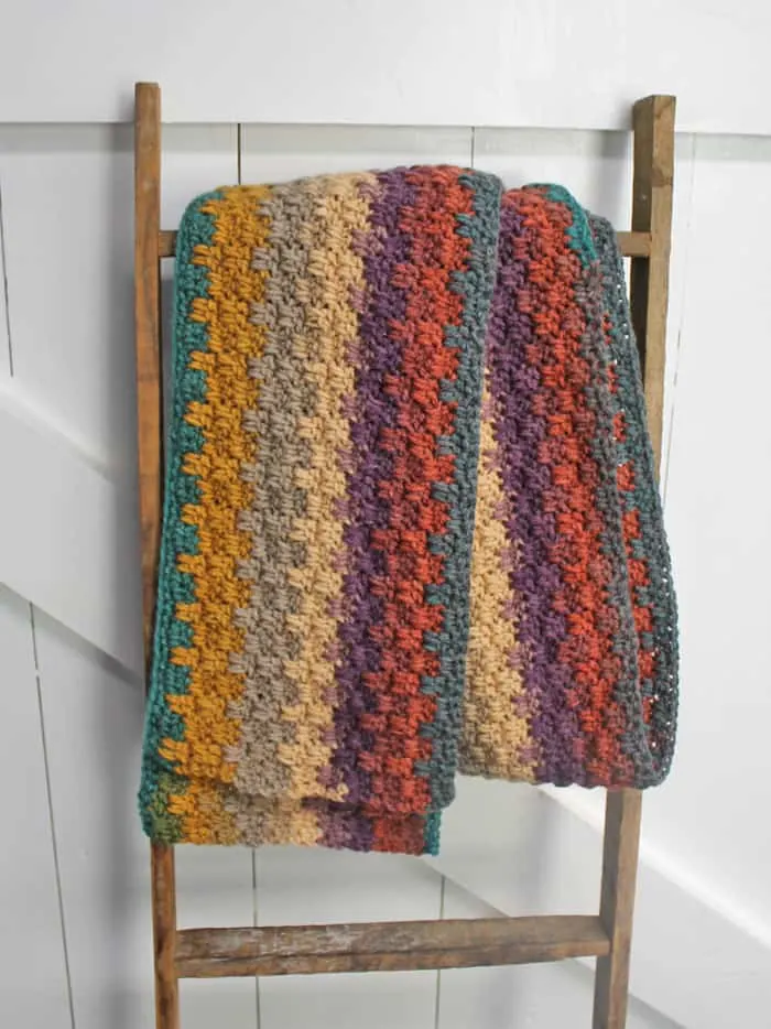 Try this easy striped crochet scarf pattern. There is a free PDF available.