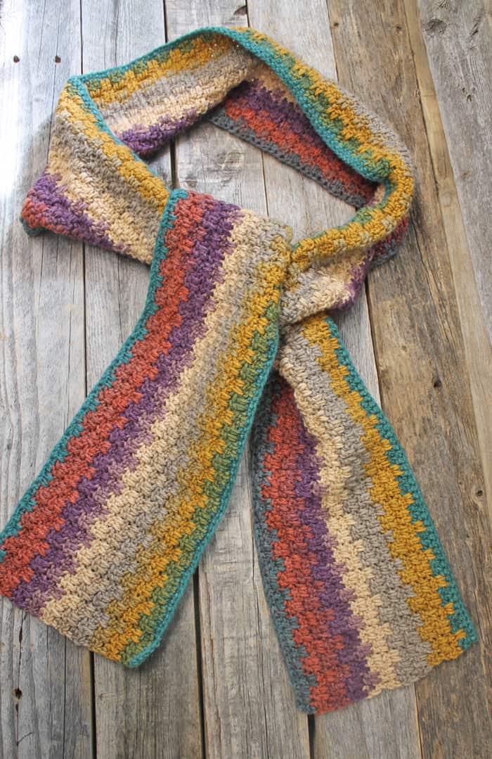 Try this easy striped crochet scarf pattern. There is a free PDF available.