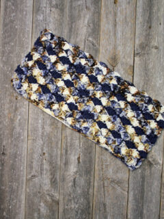 Make this pretty shell cowl crochet pattern. Look good and keep warm this winter with a free cowl crochet pattern.