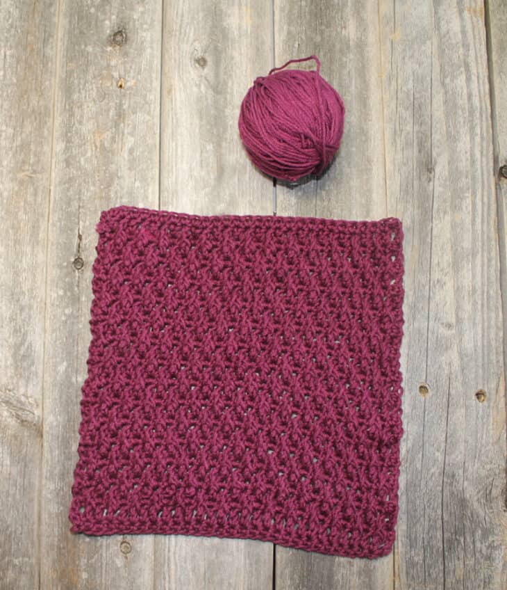Try the alpine crochet stitch. With this washcloth pattern, you will learn this raised texture stitch.