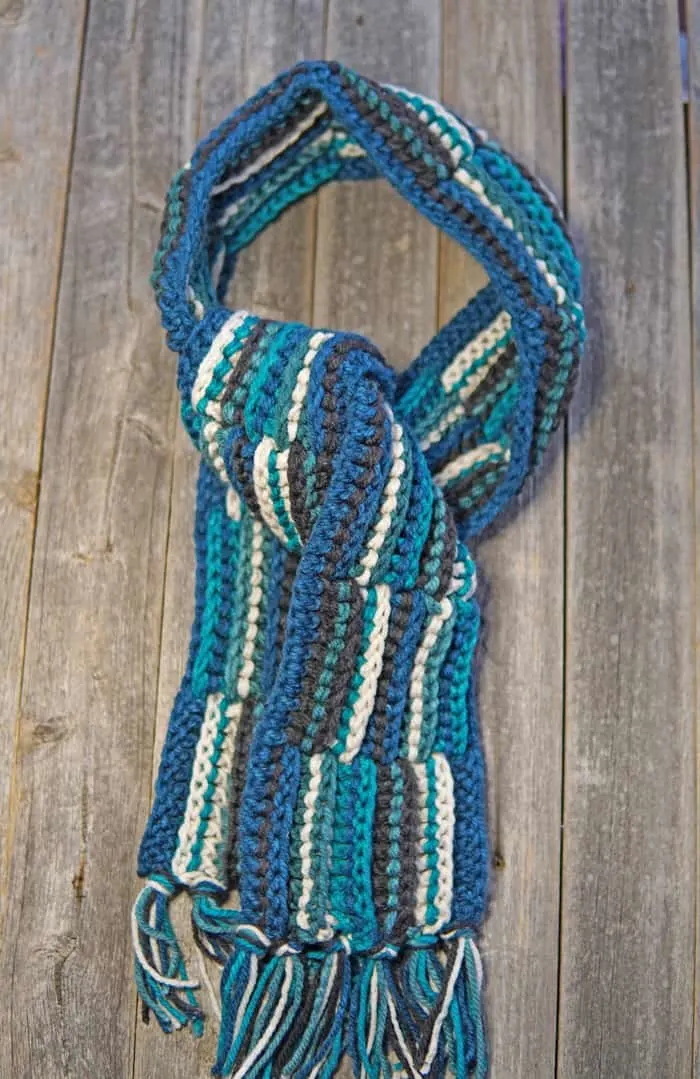 Try this free woven lines chunky scarf crochet pattern. This pattern is made using easy stitches.