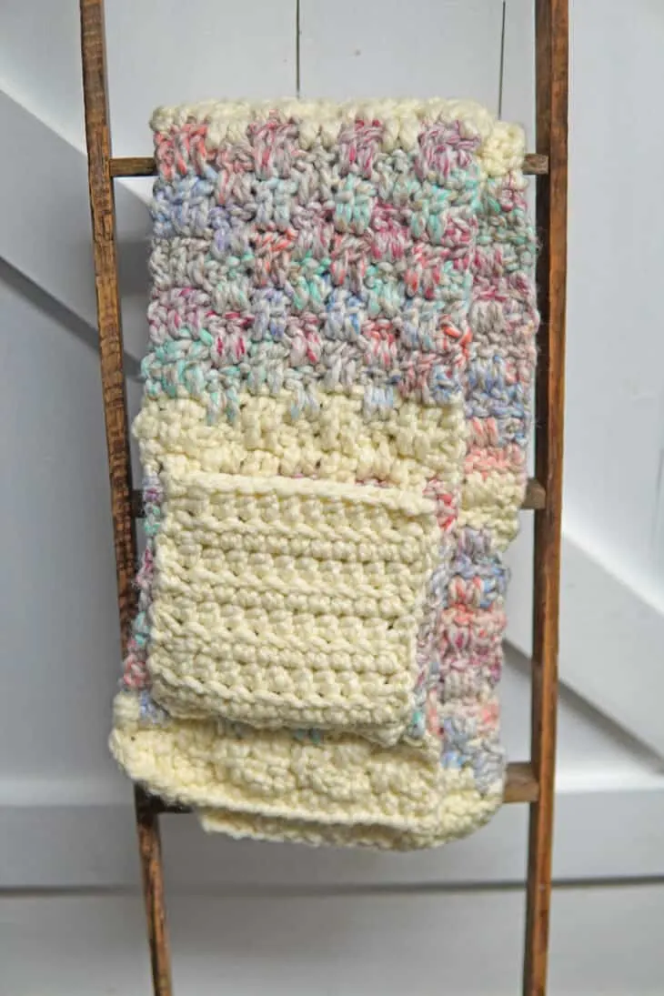 Try this chunky pocket scarf crochet pattern. This free PDF pattern uses an easy combination of double crochet stitches.