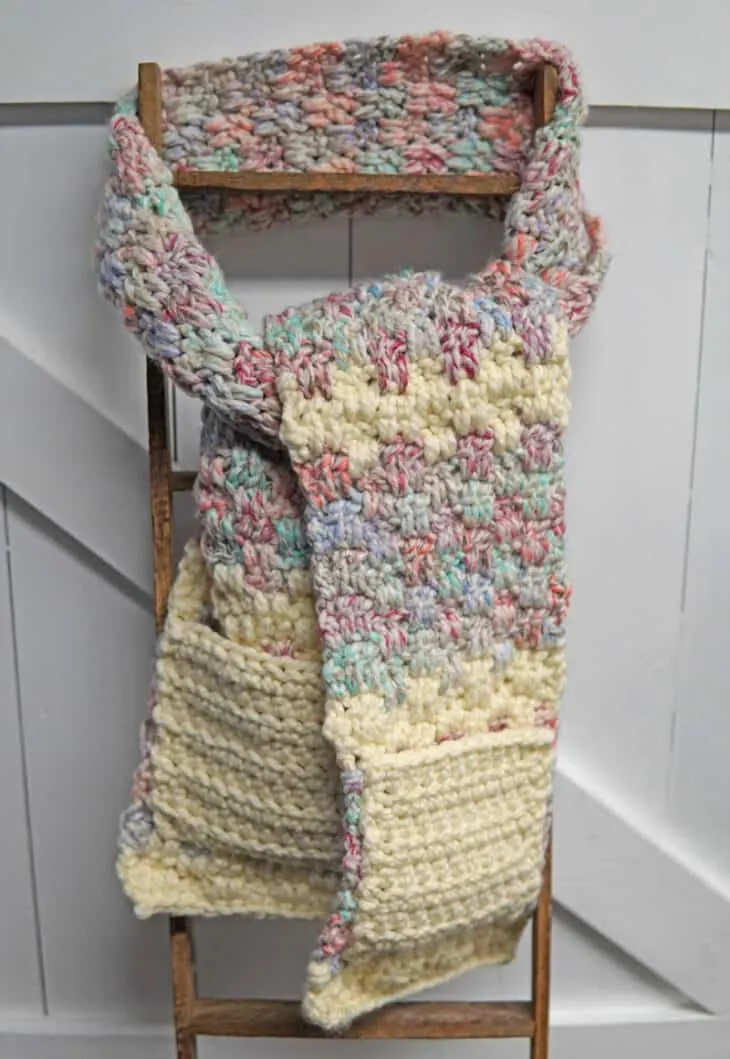 Try this chunky pocket scarf crochet pattern. This free PDF pattern uses an easy combination of double crochet stitches.