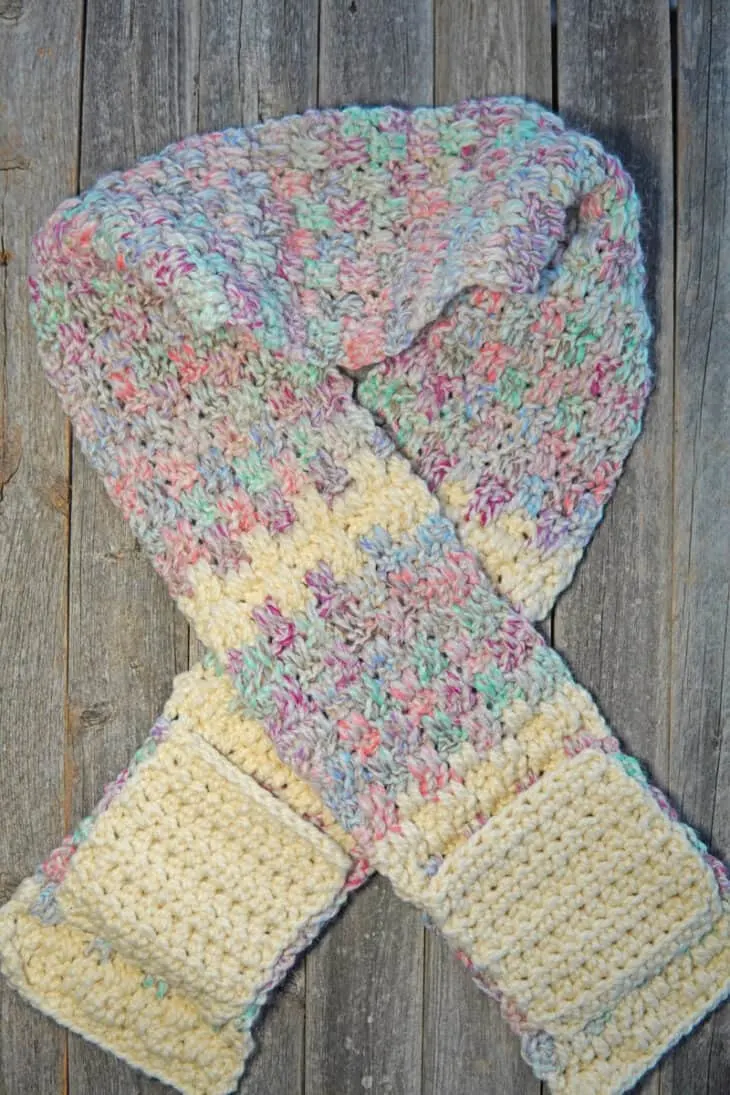 Try this chunky pocket scarf crochet pattern. This free PDF pattern uses an easy combination of double crochet stitches.