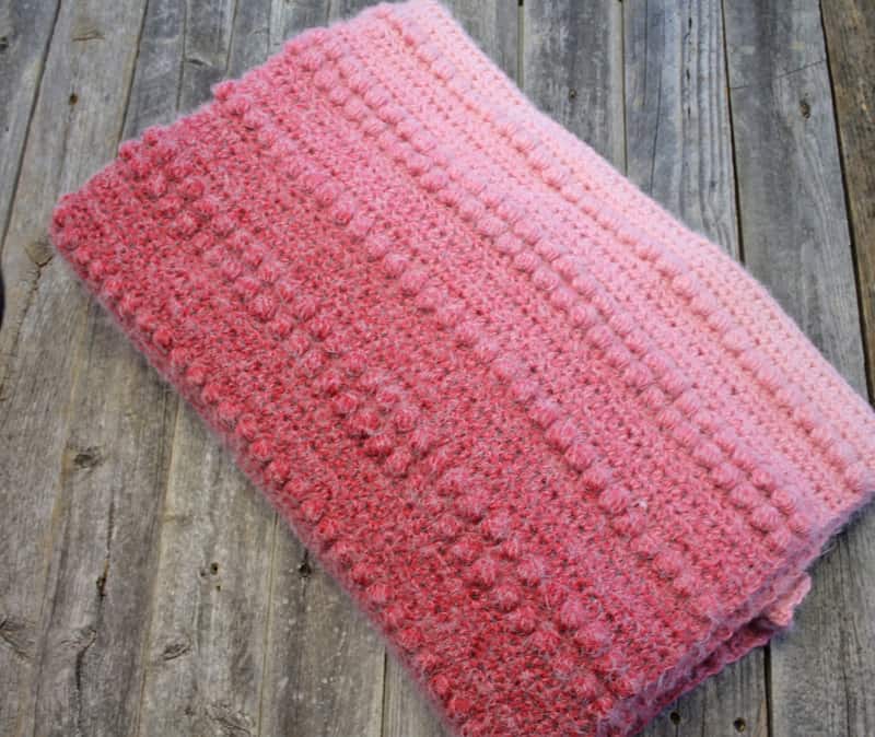 Try this pretty textured ombre throw pattern. There is a free PDF available.
