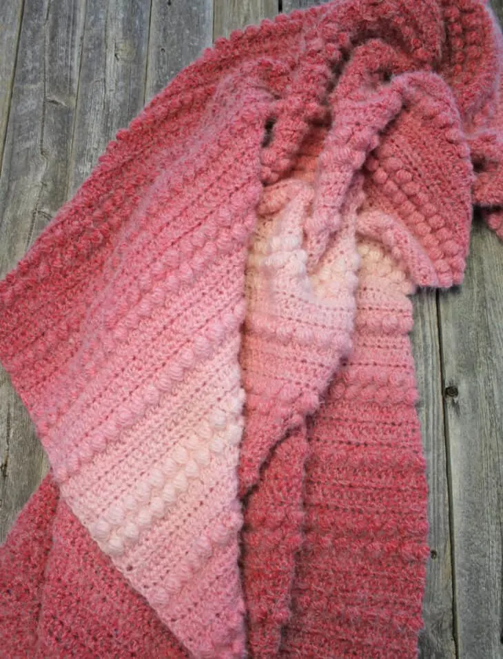 Try this pretty textured ombre throw pattern. There is a free PDF available.