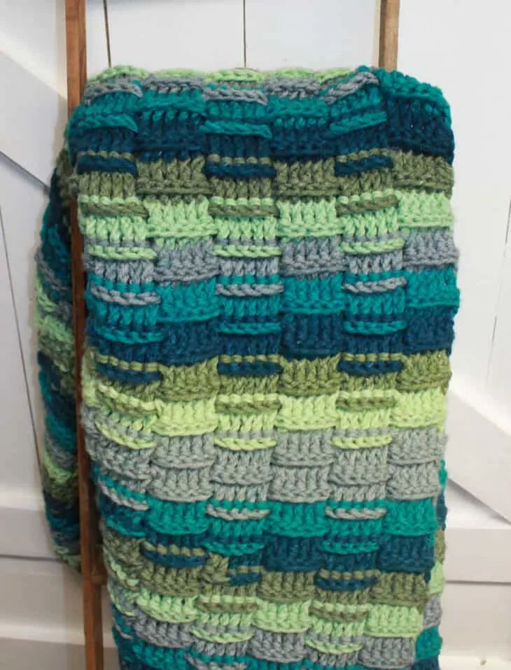 Try this easy chunky crochet throw blanket pattern. This pattern uses a variation of double crochet stitches to make a great texture. There is a free PDF pattern available.