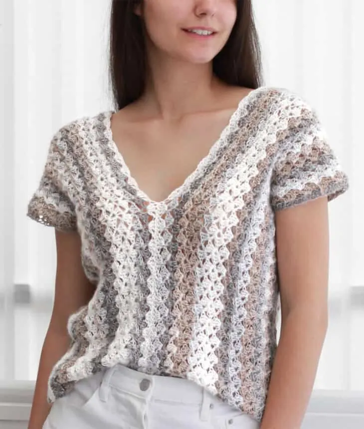 Try this easy crochet top pattern. It would look great in lots of colors.