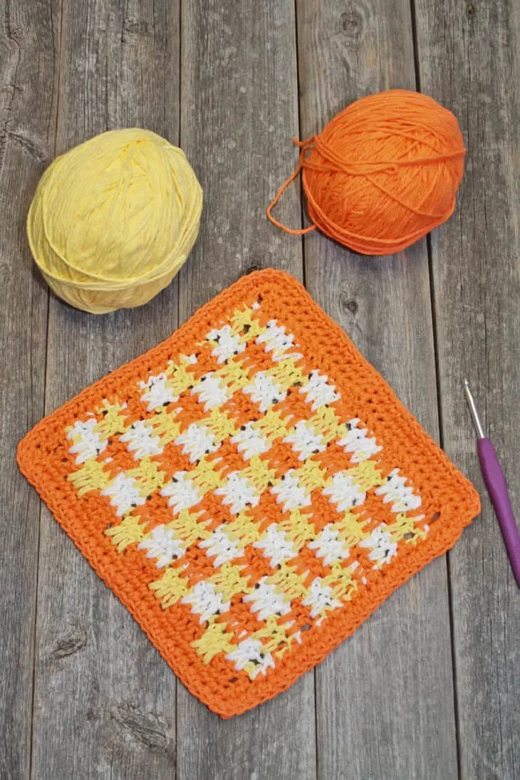Try this pattern for a crochet dishcloth. This is an easy pattern using double crochet stitches.