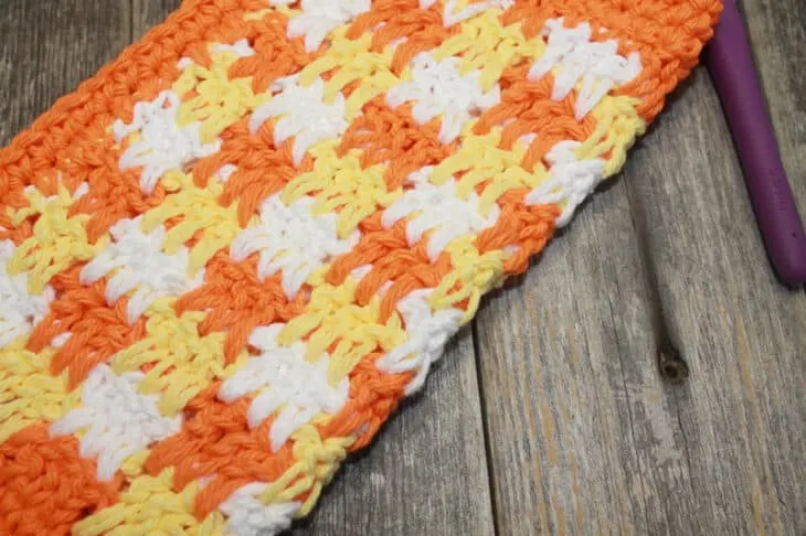 Try this colorful checkboard crochet dishcloth pattern. This pattern uses basic stitches to make this pattern. There is a free printable PDF.