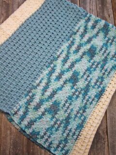 Try this textured cotton baby blanket pattern. This crochet pattern uses basic stitches to make the great texture. There is a free printable PDF.
