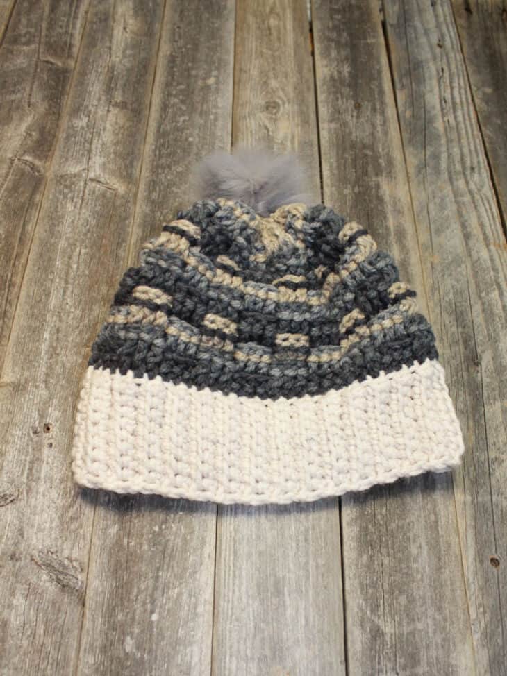 Try this bulky yarn crochet hat pattern. This hat is an quick and easy project. Make it in your favorite colors and top it with a faux fur pom pom.