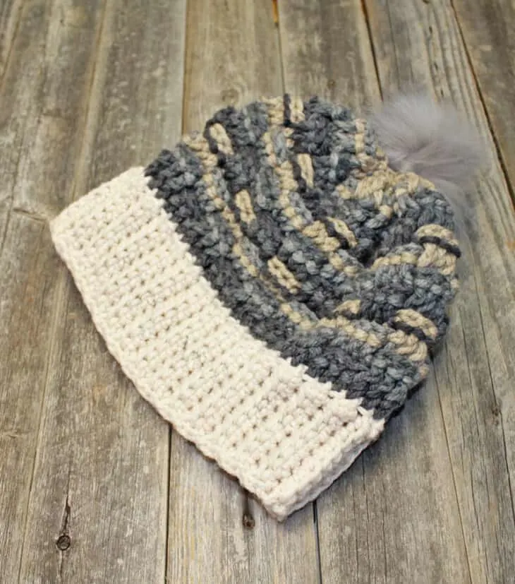 Try this bulky yarn crochet hat pattern. This hat is an quick and easy project. Make it in your favorite colors and top it with a faux fur pom pom.