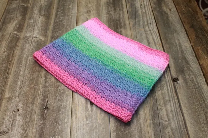 Try this pink sparkle cowl crochet pattern. This pattern is an easy repeat.