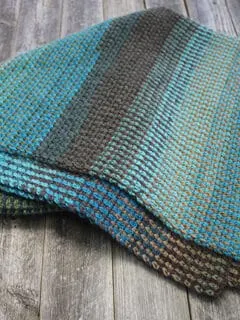 Try this easy striped linen stitch crochet blanket pattern. There is a free PDF available.