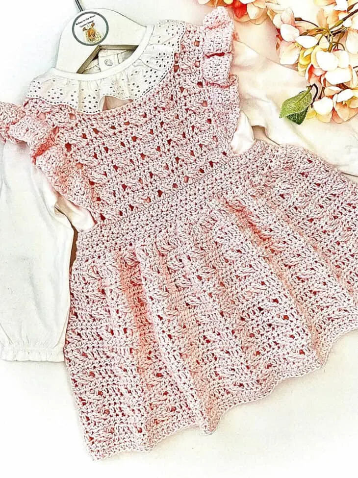Make your own adorable crochet dress pattern.